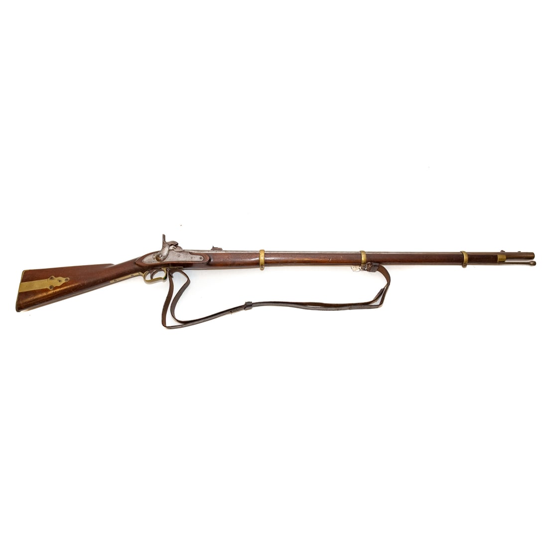 A P.S. Justice Model 1861 Rifled Musket: Philadelphia, circa 1861, the second type, with brass mounts (about 2500 produced, many scrapped for poor quality); .69 caliber; the barrel, 38 in. L; leather shoulder strap of the period; "P.S. Justi