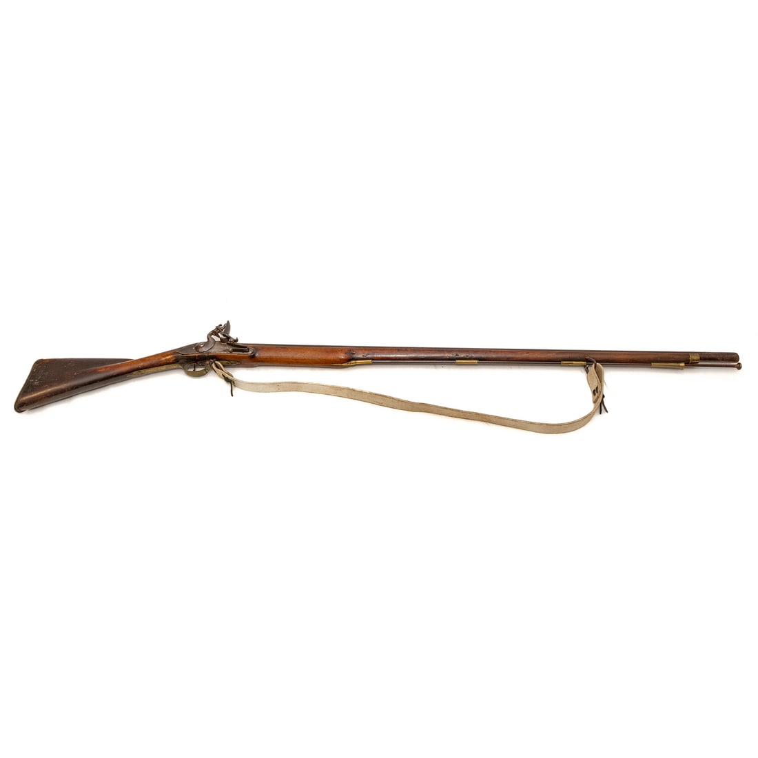 A "Committee of Safety" Flintlock Musket: Flintlock musket; no visible marks; with new leather shoulder strap; .75 caliber; 44 in. L, barrel; 60 in. L, overall Provenance: From The Estate of Timothy Lee App, Baltimore, MD