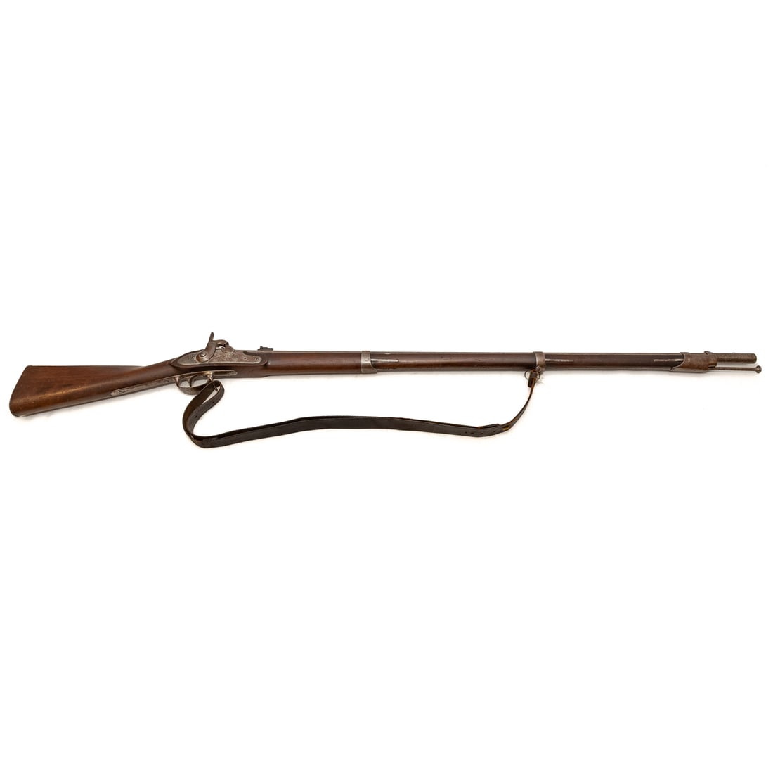 A Springfield Model 1816 Percussion Musket: Springfield Armory, 1828, originally made as a flintlock with later bolster conversion; .69 caliber; the barrel, 41 in. L; leather shoulder strap; faint "U.S.," stamped in front of hammer and "Springf