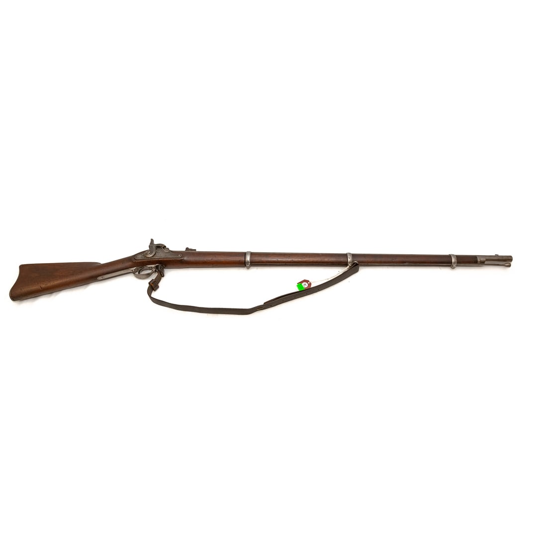 A Springfield Model 1863 Percussion Rifle: Type I, dated 1863; .58 caliber; the barrel, 40 in. L; leather shoulder strap; the lock plate marked "U.S. Springfield," with two eagles, in front of hammer; "1863," stamped behind hammer, and on top 