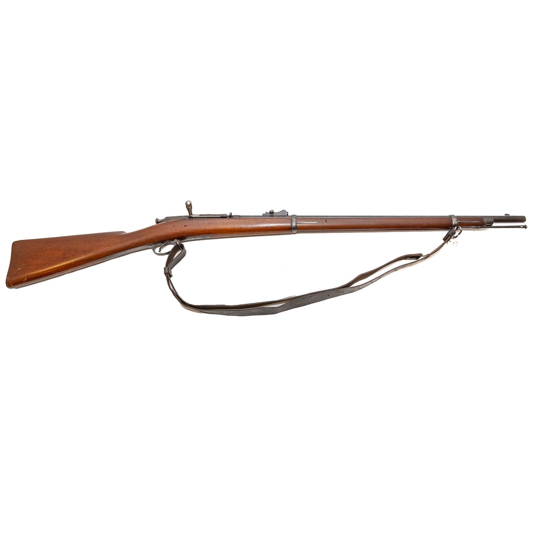 A Springfield Model 1882 Chaffee Reese Rifle: Dated 1884; one of the rarest US longarms, hand built at the Armory for trials in a run of about 750; .45/70 caliber; the barrel, 28 in. L; shoulder strap of the period; the top of receiver marked "U.