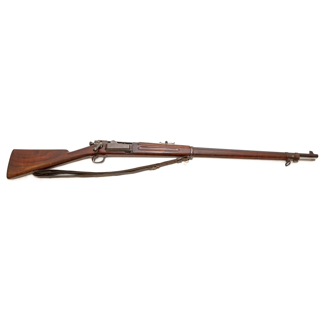 A Springfield Model 1894 Krag Jorgensen Rifle: Serial number 9347, marked on left side of receiver; bolt action, fed from 5-round magazine; .30-40 caliber, smokeless powder cartridge; the barrel, 30 in. L; with leather shoulder strap; left side of