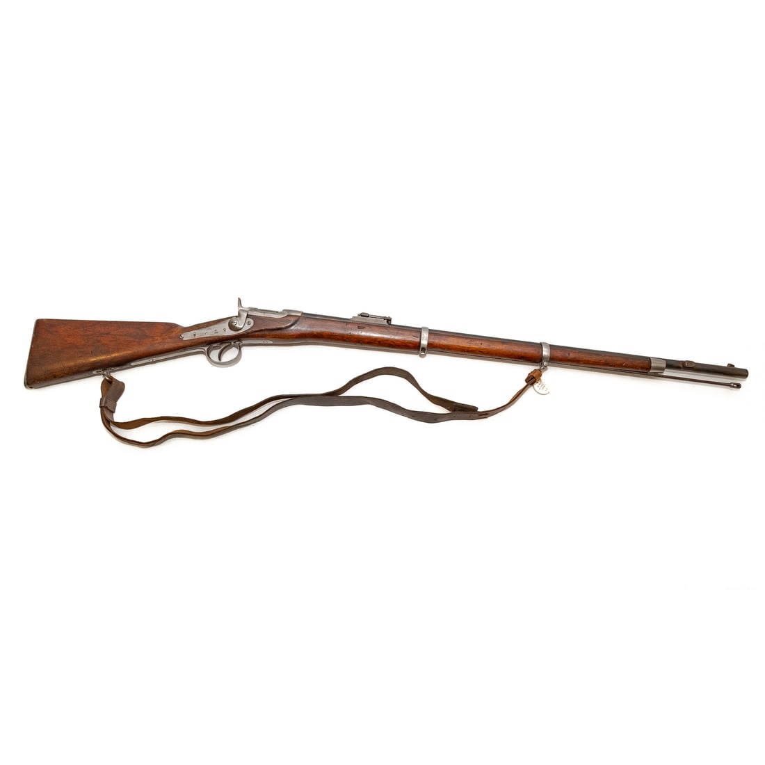 An Austrian Werndl-Holub Percussion Rifle: Model 1867; 11mm caliber; the barrel, 33 in. L; with a leather shoulder strap; the top of receiver marked "Werndl; "S70," stamped on top of barrel end; "868," marked on lock plate; numerous numbers an
