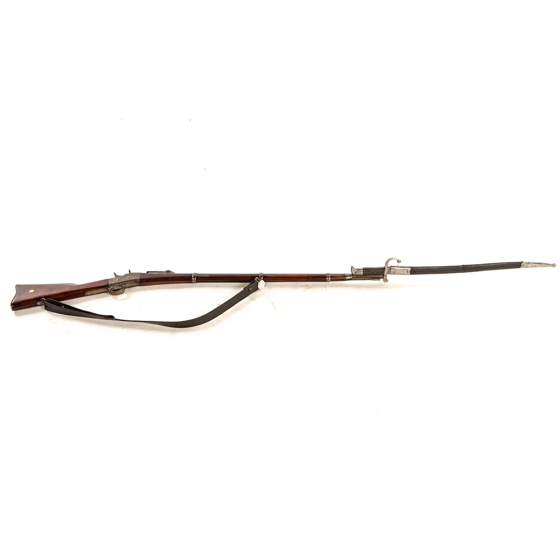 A Danish Model 1867/1896 Rolling Block Rifle: Serial number 61095 and a crown marked on left side of barrel breech; 11.35 caliber; the barrel, 35 in. L; stick bayonet; leather shoulder strap; various marks, including a crown stamped over script r