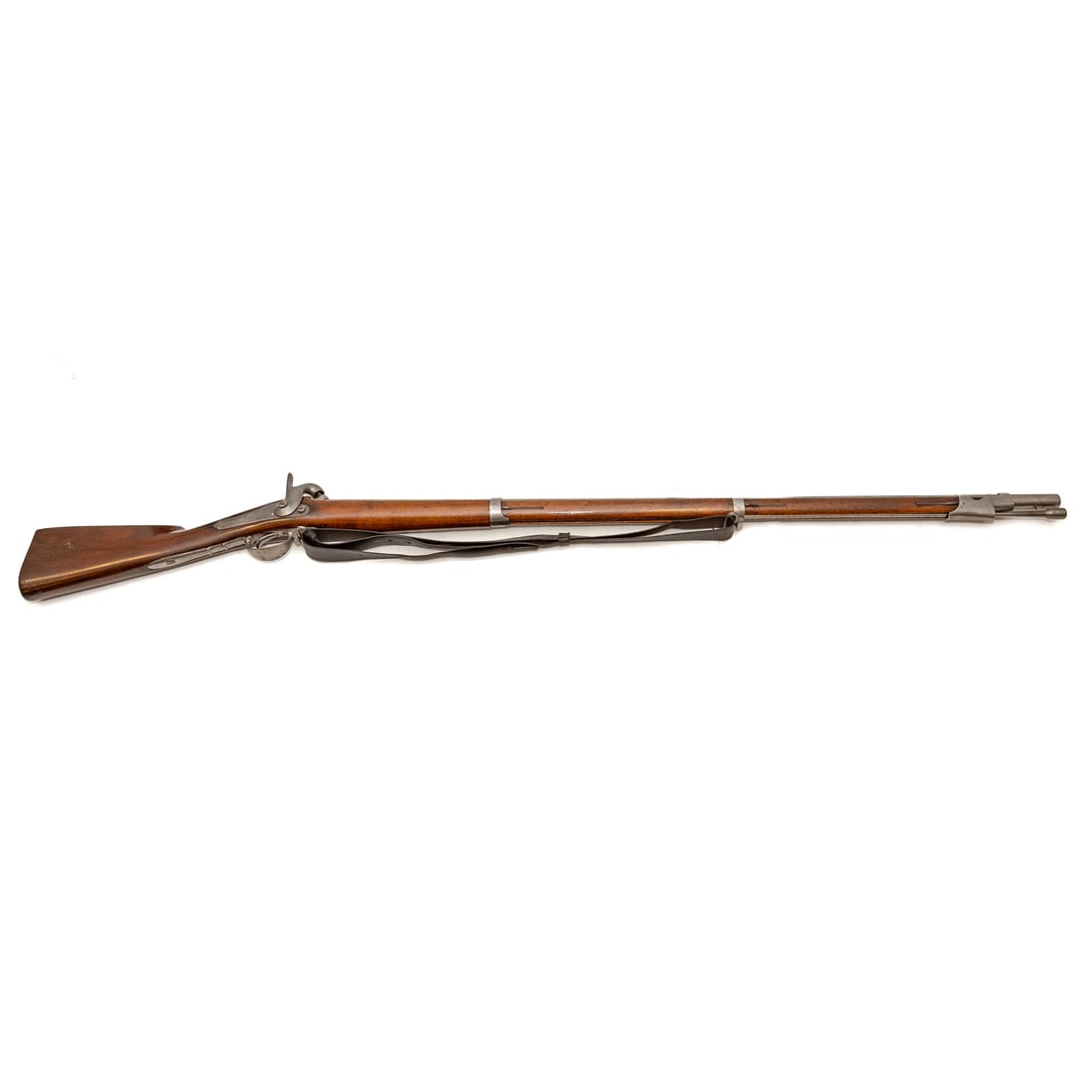A Saint Etienne Model 1842 Percussion Musket: .70 caliber; 42 in. L, barrel; leather shoulder strap; marked "Mre. Rle. De Saint Etienne," on right side of lock plate; "Mle, 1842," stamped on top strap; proof marks on top of butt plate, on barrel 