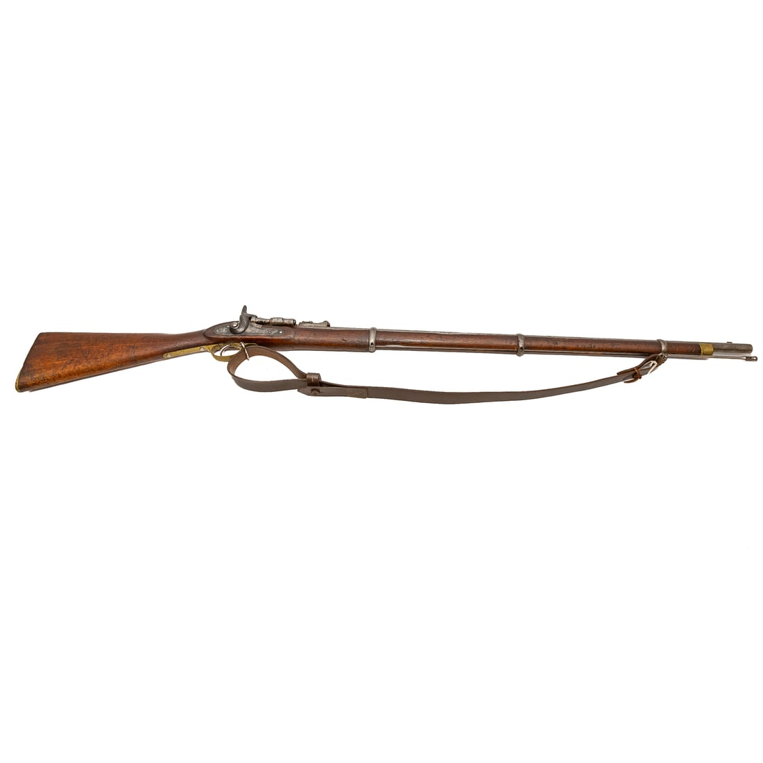 A British 1861 Enfield-Snider Percussion Rifle: Serial number 6706, marked inside the breech; armory conversion using the Snider breechloading patent; .577 caliber, metallic centerfire cartridge; 36 in. L, barrel; with leather shoulder strap; marke