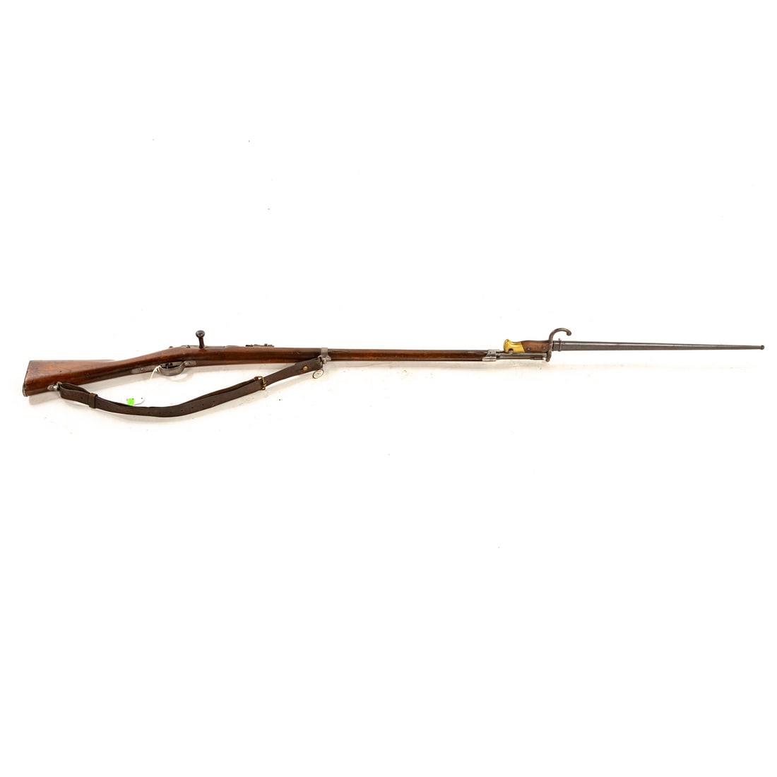 A French Chassepot Model 1866 Rifle: Serial number: M28189, stamped on left side of barrel back and bayonet slide; 11mm caliber; the barrel, 32 1/2 in. L; leather shoulder strap; left side of receiver marked " MLE, 1866 St. Ettiene"; pro