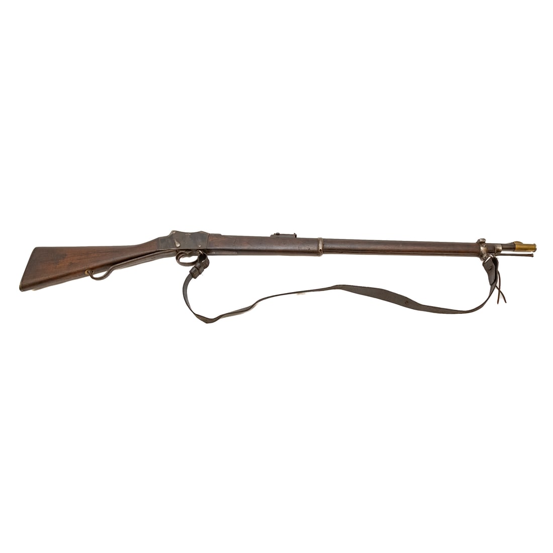 A British Pattern 1886 Martini Henry Mark IV Rifle: Dated 1886; serial number: 1009, stamped on left side of barrel back; operations functional; 450 caliber; the barrel, 34 in. L; leather shoulder strap; right side of receiver marked with a crown above