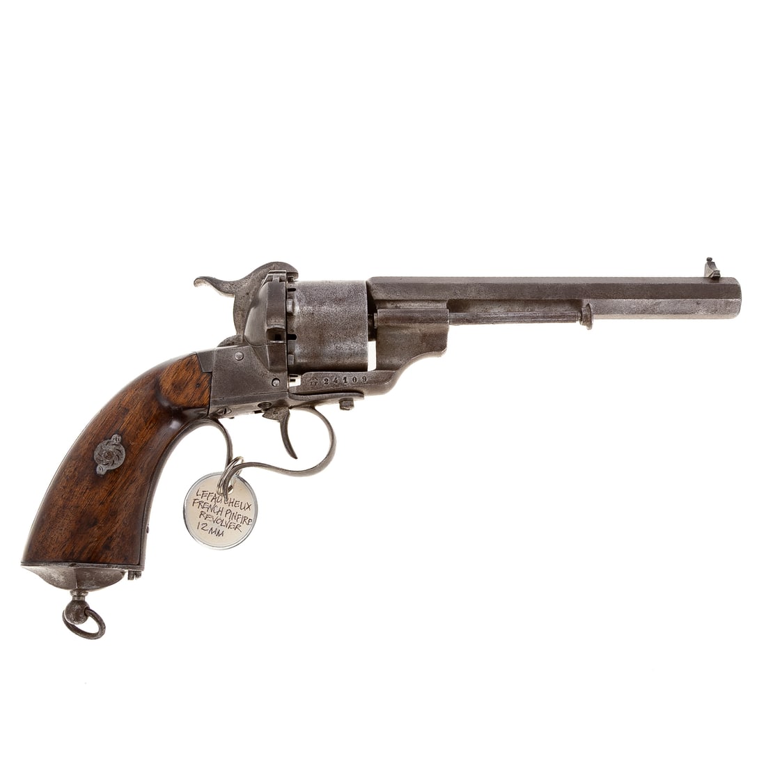 A Colt Model 1894 Army Revolver: Serial number 765, visible on butt, and twice inside cylinder housing; double action, with swing-out cylinder; .38 caliber, long Colt cartridge; the barrel, 6 in. L; with a swivel lanyard ring on butt