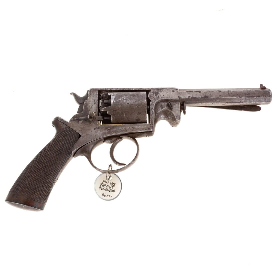 A Deane Adams Patent 1851 Double Action Revolver: Made in England; Serial number 40444 etched on cylinder; .36 caliber; the barrel, 5 1/2 in. L; "Adams Patent No. 40444," stamped on right side of receiver; two proof marks stamped on left side top of