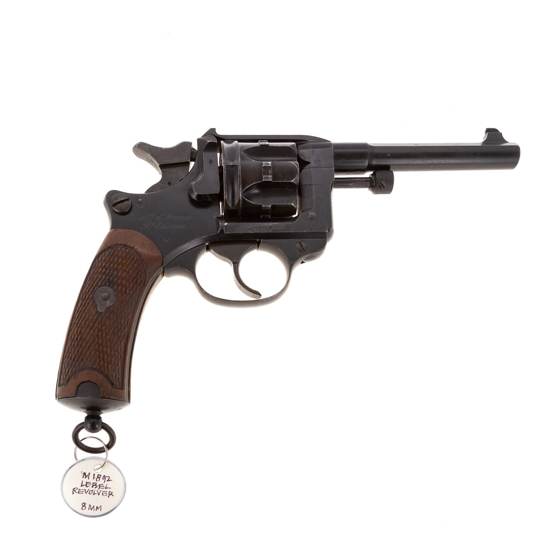 A Saint-Etienne Model 1892 Lebel Revolver: Double-action, 8mm caliber; the barrel, 4 1/2 in. L; engraved "model 1892," on top of barrel and "S 1898"; stamped "K," on left side of trigger; stamped number "2," on left side of hammer; stamped "C,