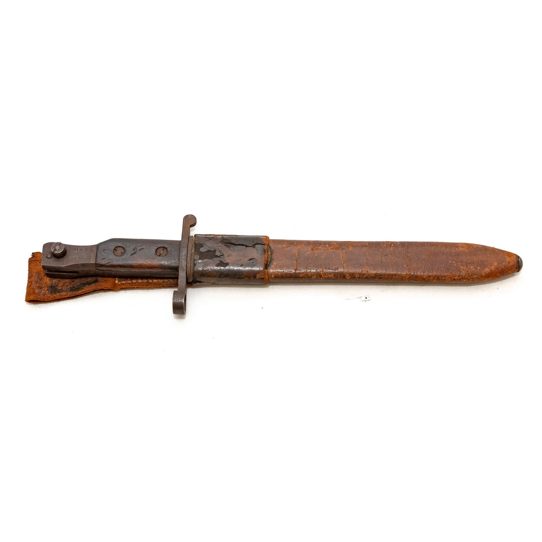 A Ross Rifle Co. Model 1907 WWI Bayonet: Quebec; stamped "US," on the wood grip; 14 1/2 in., overall bayonet length; scabbard and attachment 16 in. overall Provenance: From The Estate of Timothy Lee App, Baltimore, MD