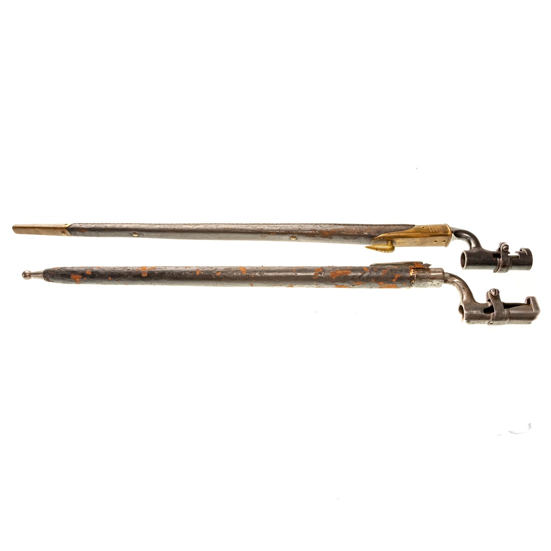 Two Stick Bayonets With Leather Sheaths: One unmarked, the other with proof marks on all blade surfaces; the longest measuring 21 3/4 in. overall Provenance: From The Estate of Timothy Lee App, Baltimore, MD