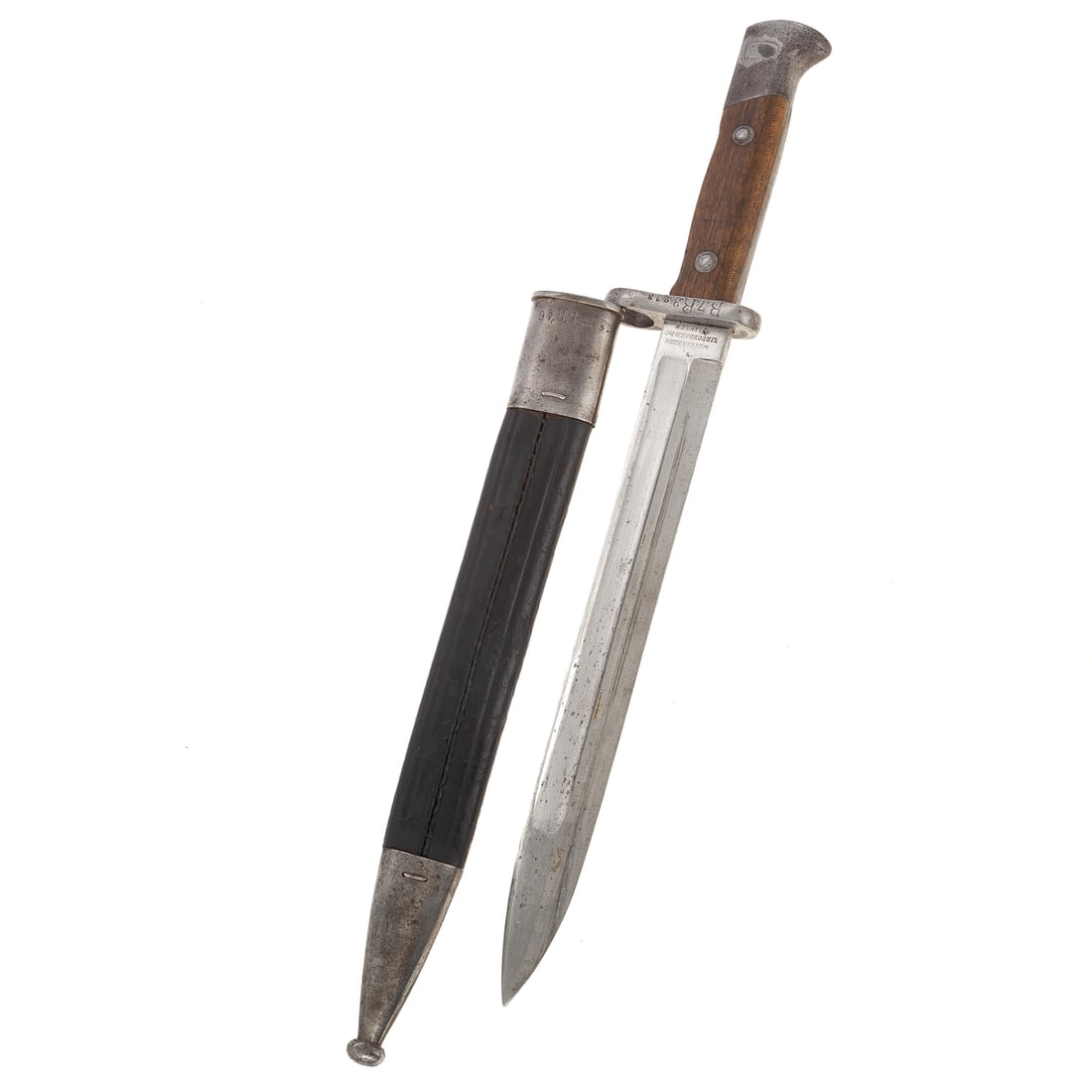 A German Bayonet: With leather sheath;"B7R3213," stamped to one side of hand guard; the other stamped "19204"; marked "Weyemsberg, Kirschbaum & Co., Solingen" on blade; sheath marked "97.R.R.353.," with proof mark; 15 