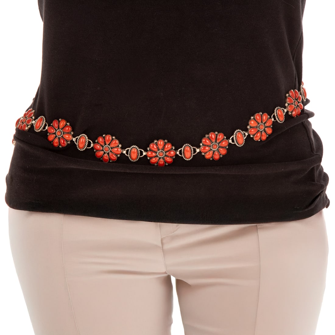 A Mary Marie Yazzie Lincoln Coral Concho Belt in Sterling Silver: Sterling silver coral concho belt by Navajo artist Mary Marie "Yazzie" Lincoln (b. 1943), featuring well matched deep red coral, oxblood color, set in flower design links alternating with oval coral w