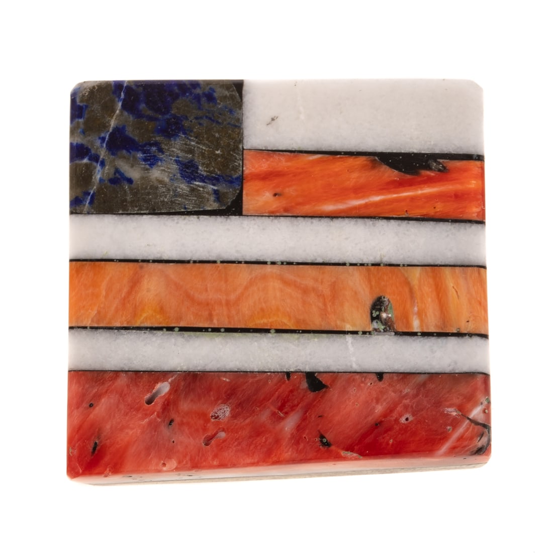 A Mary Louise Tafoya American Flag Pin/Pendant: Mosaic pin/pendant of the American flag by Kewa artist Mary Louise Tafoya featuring sodalite, white jade, spiny oyster, and coral, split bail and pin on reverse, signed with initials and pictograph, 1