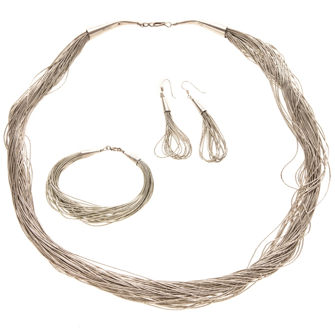 A Set of Liquid Silver Jewelry in Sterling Silver: Sterling silver liquid jewelry set including a 50 strand necklace, cone terminals and hook clasp, 24 in. L, 30 strand bracelet, cone terminals and spring ring clasp, 6 3/4 in. L, and 10 strand earring
