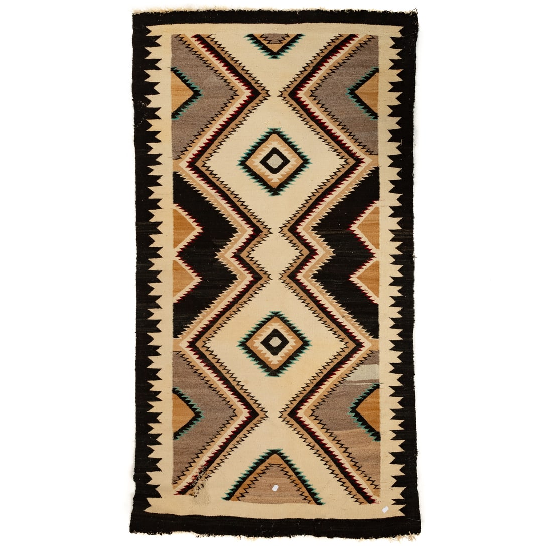 A Navajo Trade Rug, 6.8 x 3.7: Third quarter, 20th century, with geometric design in various colors on a light field