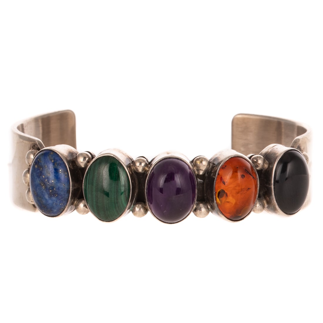 A Ray Bennett Navajo Gemstone Cuff in Sterling Silver: Sterling silver cuff bracelet by Navajo artist Ray Bennett, featuring bezel set oval lapis lazuli, malachite, amethyst, amber and black onyx, signed, 2 3/8 interior Diam., 44.5 grams Provenance: From 