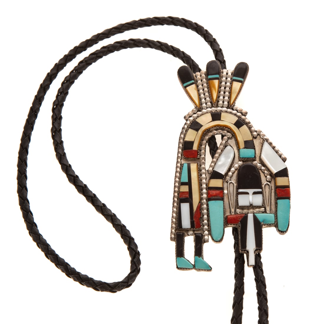 A Signed Zuni Rainbow Man Bolo Tie in Sterling Silver: c.1970s, sterling silver inlaid Rainbow Man design bolo tie by Zuni artists Herbert and Esther Cellicion, featuring inlaid gemstones including turquoise, coral, Mother of pearl, and jet, Rainbow Man b