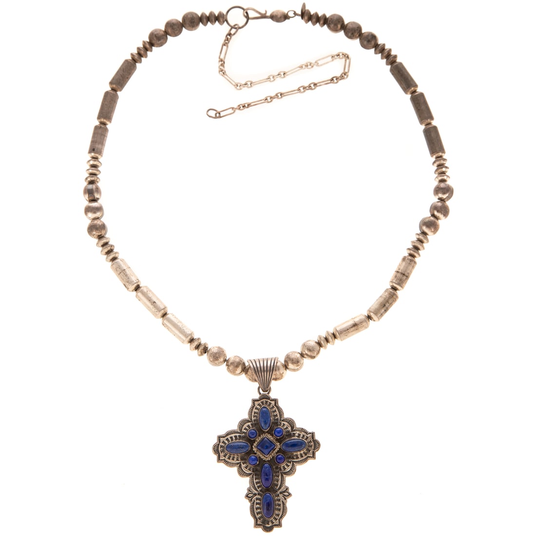 An Albert Jake Lapis Cross Pendant in Sterling Silver: Sterling silver lapis lazuli cross pendant by Navajo artist Albert Jake (b. 1959), signed, 3 in. L hanging on sterling silver various shape beaded necklace, signed "SL," with hook clasp, 26 in. L, 52.