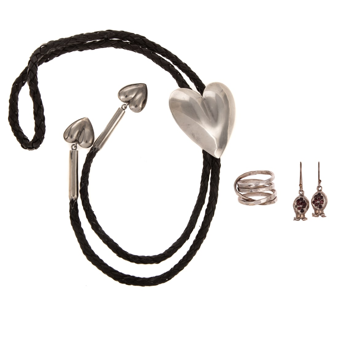 A Collection of Southwestern Jewelry in Sterling Silver: 1) Sterling silver bolo tie in the style of Elwood Reynolds, signed illegibly, on braided leather cord with high polish heart bolo and aiguillette, 2) Sterling silver hammered finish crisscross band b