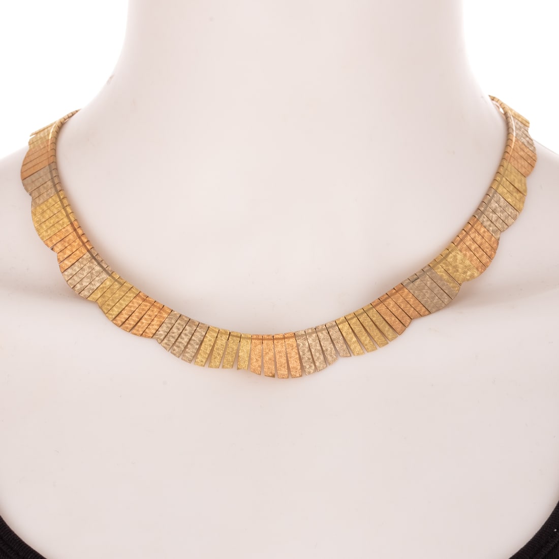 An Italian Tri-Gold Fringe Necklace in 14K: Vintage 14K yellow, rose and white gold Italian graduated fringe necklace with matte, textured finish and high polish band near the edge, hidden box clasp and safety latch, 17 in. L, 38.2 grams