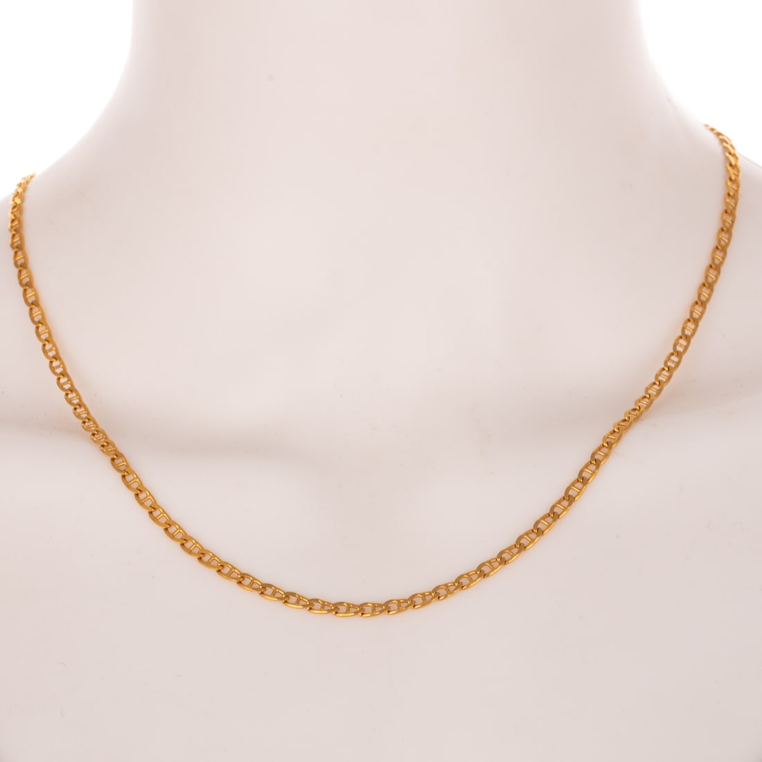 An Italian Anchor Link Necklace in 18K: 18K yellow gold Italian necklace featuring flattened anchor links, lobster clasp, 19 3/4 in. L, 10.4 grams