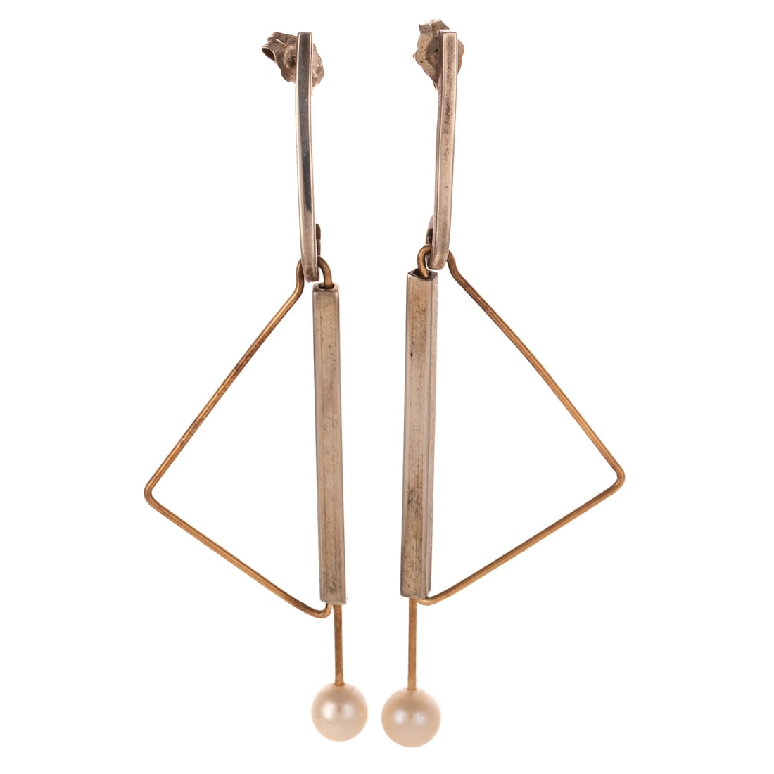 A Pair of Early Betty Cooke Dangle Earrings in Sterling Silver & 14K: Sterling silver and 14K yellow gold dangle earrings by Betty Cooke (1924 - 2024), Baltimore, MD, featuring a 5.5 mm cultured pearl at bottom of open triangle form, post with friction backs, signed, 1 