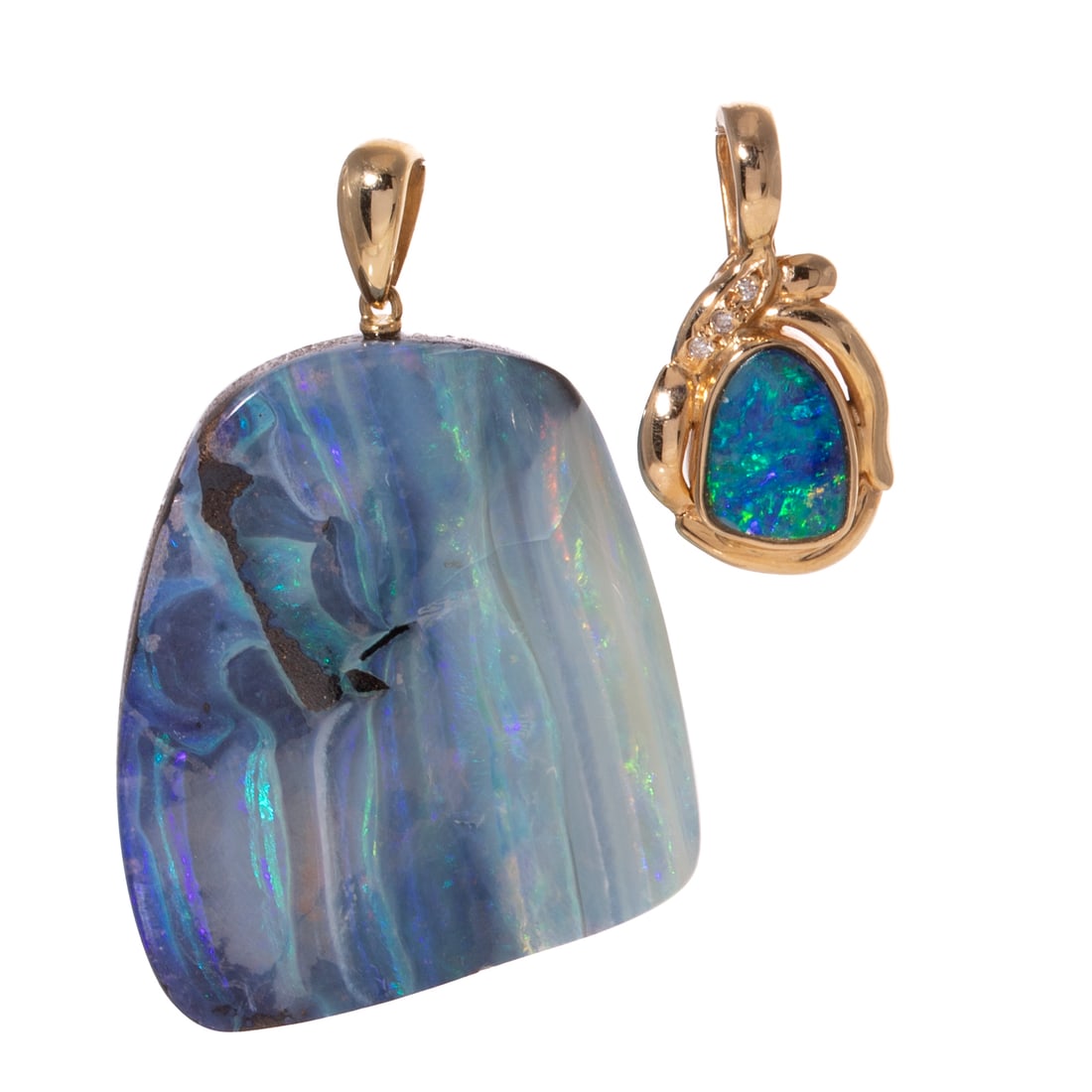 Two Boulder Opal Pendants in 14K: 1) 14K yellow gold pendant featuring an organically shaped black boulder opal cabochon with strong blue and green play-of-color bezel set in a wide high polish frame with round diamond prong set accen