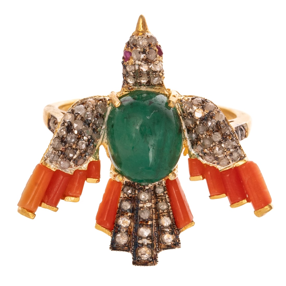 An Emerald, Coral & Diamond Bird Ring: Vermeil ring depicting a bird in flight with an oval shaped emerald cabochon prong set as the body with rose cut diamond pave wings, tail feathers, and head, ruby eyes, coral channel set feathers, add