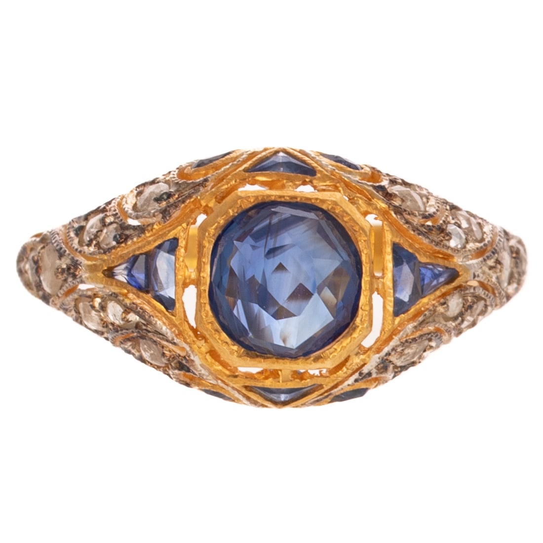 A Victorian Style Sapphire & Diamond Filigree Ring: Vermeil ring featuring a mixed Old Mine cut sapphire weighing approx. 1.20 cts bezel set in a domed filigree setting with mixed cut sapphires bead and channel set with rose cut diamond bead set detail