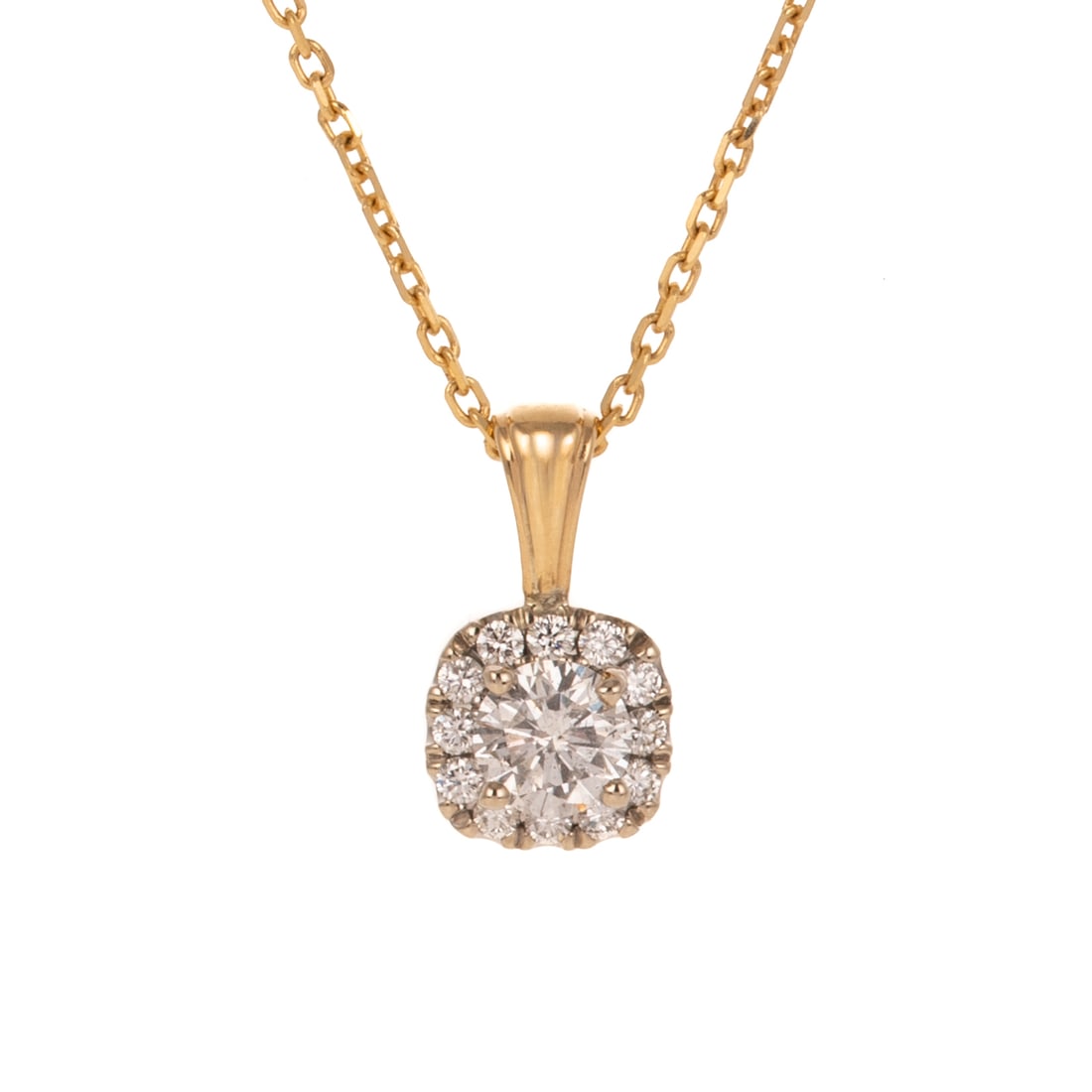 A 0.90 ctw Diamond Pendant in 14K: 14K white gold pendant by Venetti featuring a round diamond weighing approx. 0.75 ct with an average color grade of H - I and an average clarity grade of I prong set in the center of a halo of round d