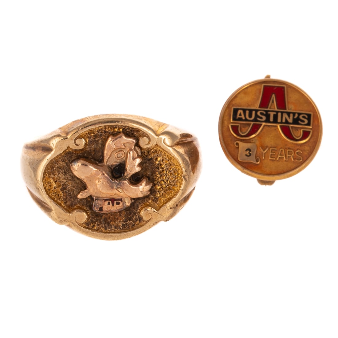 A Loyal Order of Moose Ring & Commemorative Pin in 10K: 1) 10K yellow gold ring featuring a rose gold moose head against a stipple ground, from the fraternal Loyal Order of Moose, sz 8.75, and 2) 10K yellow gold commemorative pin with enamel details, 1/2 i