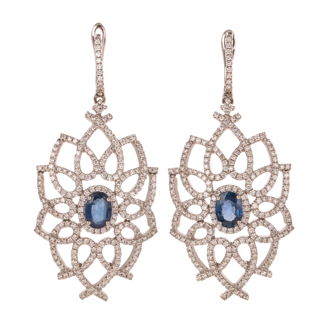 A Pair of Sapphire & Diamond Flower Earrings in 14K: 14K white gold earrings by Orianne featuring two oval shaped sapphires weighing 1.66 ctw prong set in a large radiating round diamond bead set looping flower design, signed, posts with lever backs, 2 