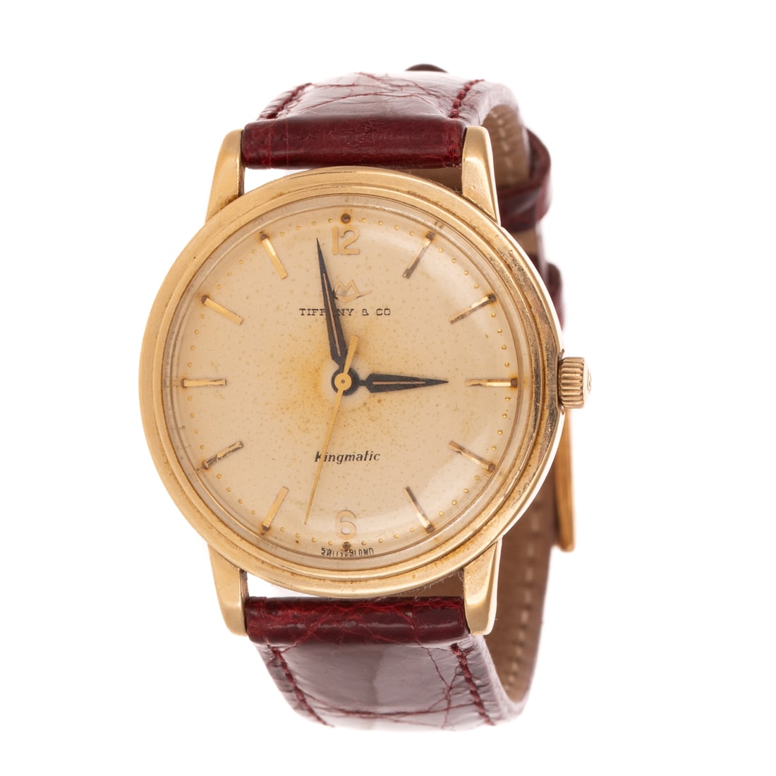 A Movado Kingmatic for Tiffany & Co in 14K: 14K yellow gold Movado Kingmatic wrist watch, retailed by Tiffany & Co, gold toned dial with dash hour markers, 28 jewel mechanical movement, Vero Croccodrillo strap made in Italy, original Tiffany &