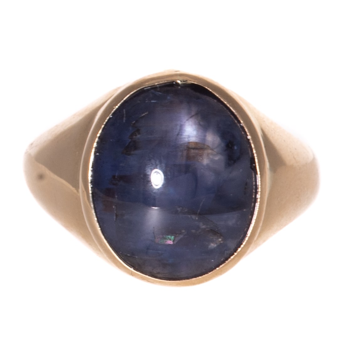 A 14.98 ct Ceylon Star Sapphire Ring in 14K: 14K yellow gold ring featuring an oval shaped Ceylon unheated star sapphire cabochon weighing 14.98 carats, accompanied by GIA Gemological Report #5231954868, bezel set, high polish shank, sz 10, 10.9