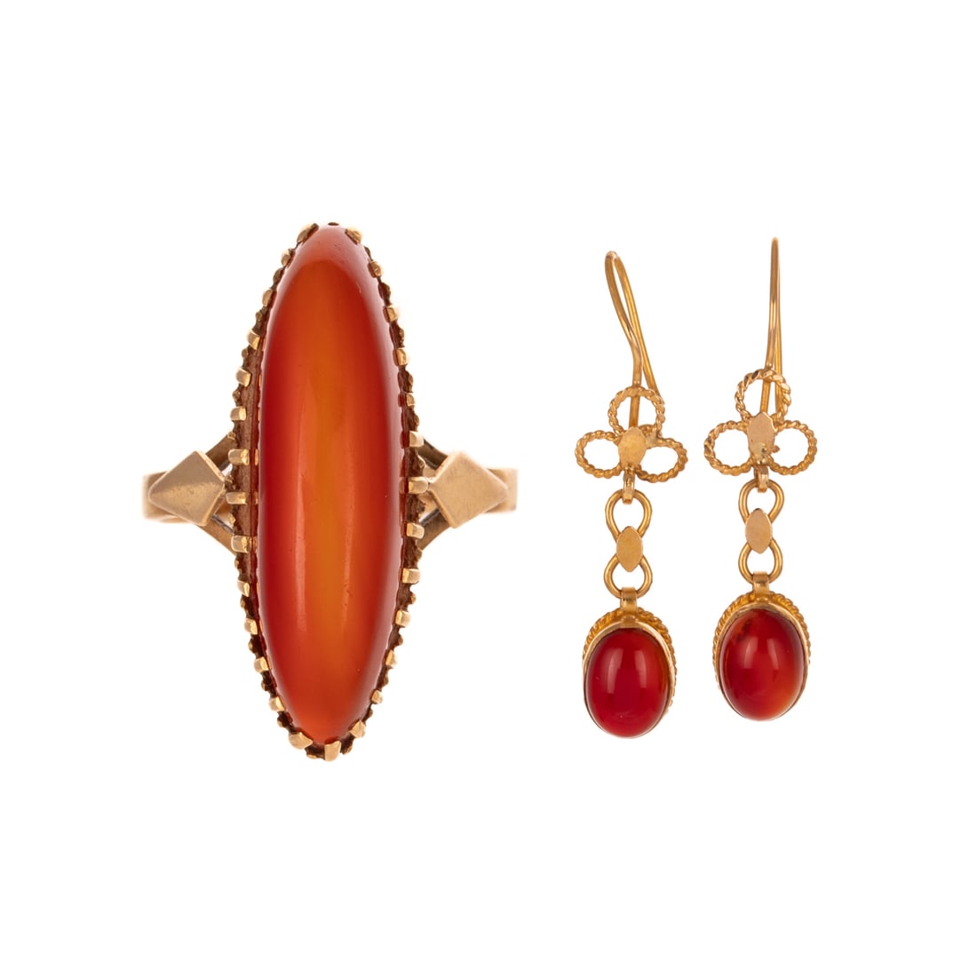 A Carnelian Ring & Garnet Earrings in 18K: 1) 18K yellow gold elongated oval carnelian cabochon measuring approx. 25 x 7.4 mm prong set, high polish shield details on shank, sz 5.5, and 2) 18K yellow gold earrings featuring oval shaped garnet 