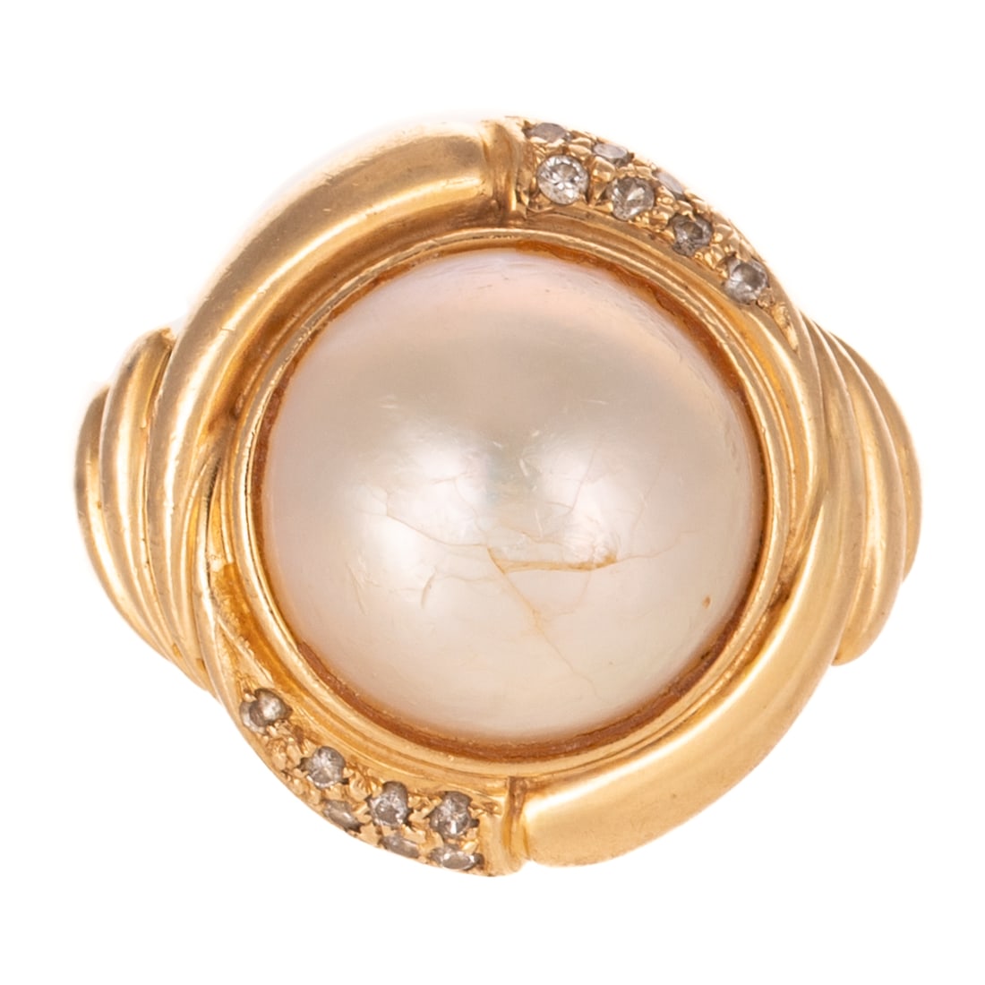 A Classic Mabe Pearl & Diamond Ring in 14K: 14K yellow gold ring featuring a round mabe pearl measuring 14.5 mm, bezel set in twisted frame with diamond accents, sz 6.5, 9.1 grams Provenance: From the private collection of a Persian emigre and 