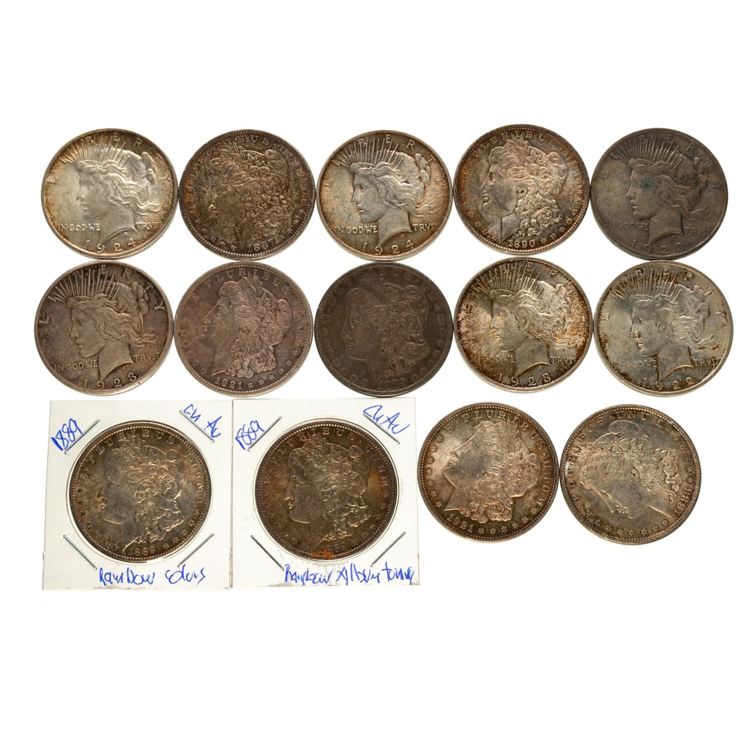 16 Silver Dollars: 1879 Original toned VF, 1883 XF45, 1887 natural toned XF, 2-1889 Multi-Color toned AU, 1890 Toned AU, 2-1921 Morgan XF,1922 toned AU, 1923 VF, 1923 Toned Choice Au, 1923-S XF, 2-1924 toned Ch AU XF Pr