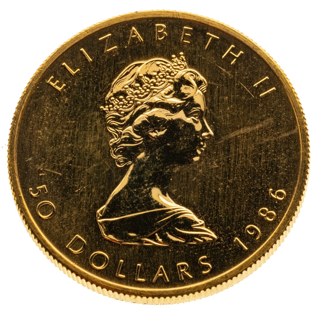 1986 One Oz Gold Canadian Maple Leaf: One of the world's purest gold coins at .9999 fine. Passed Sigma Test