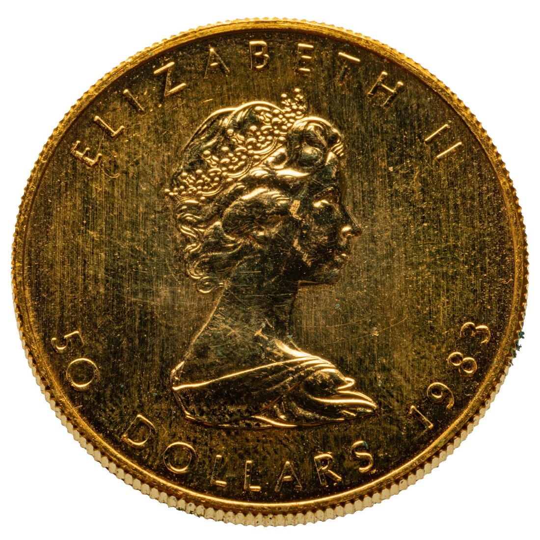 1983 1 oz Gold Maple Leaf: .9999 product of the Royal Canadian Mint. The textured details in the Maple Leaf is wonderful. Passed Sigma Test