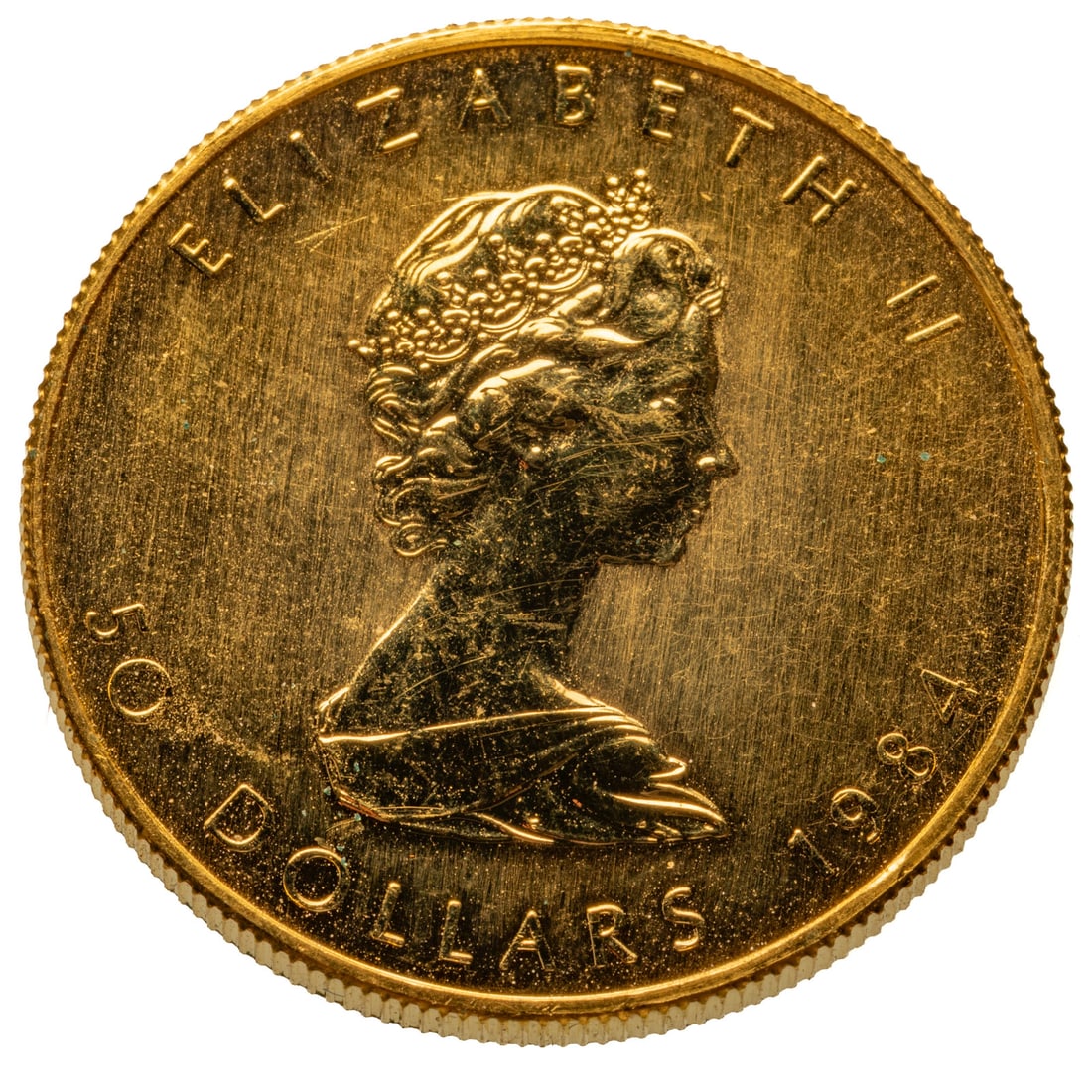 1984 1 oz Gold Maple Leaf: .9999 product of the Royal Canadian Mint. Passed Sigma Test