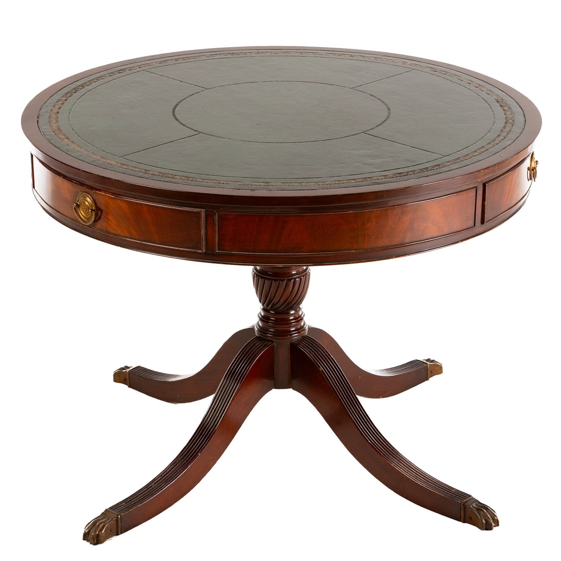 Charak Mahogany Leather Top Drum Table: Circular tooled leather top over two cockbeaded drawer apron resting on a urn form turned pedestal with four reeded saber legs ending in brass animal paw feet, 27 in. H, 36 in. Diam.