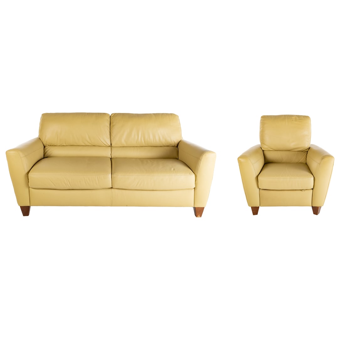 Natuzzi Contemporary Leather Sofa & Armchair: Fully leather upholstered two cushioned sofa, 34 3/4 in. H, 80 in. W, 36 in. D; together with a matching armchair, 38 in. H, 38 in. W, 34 in. D