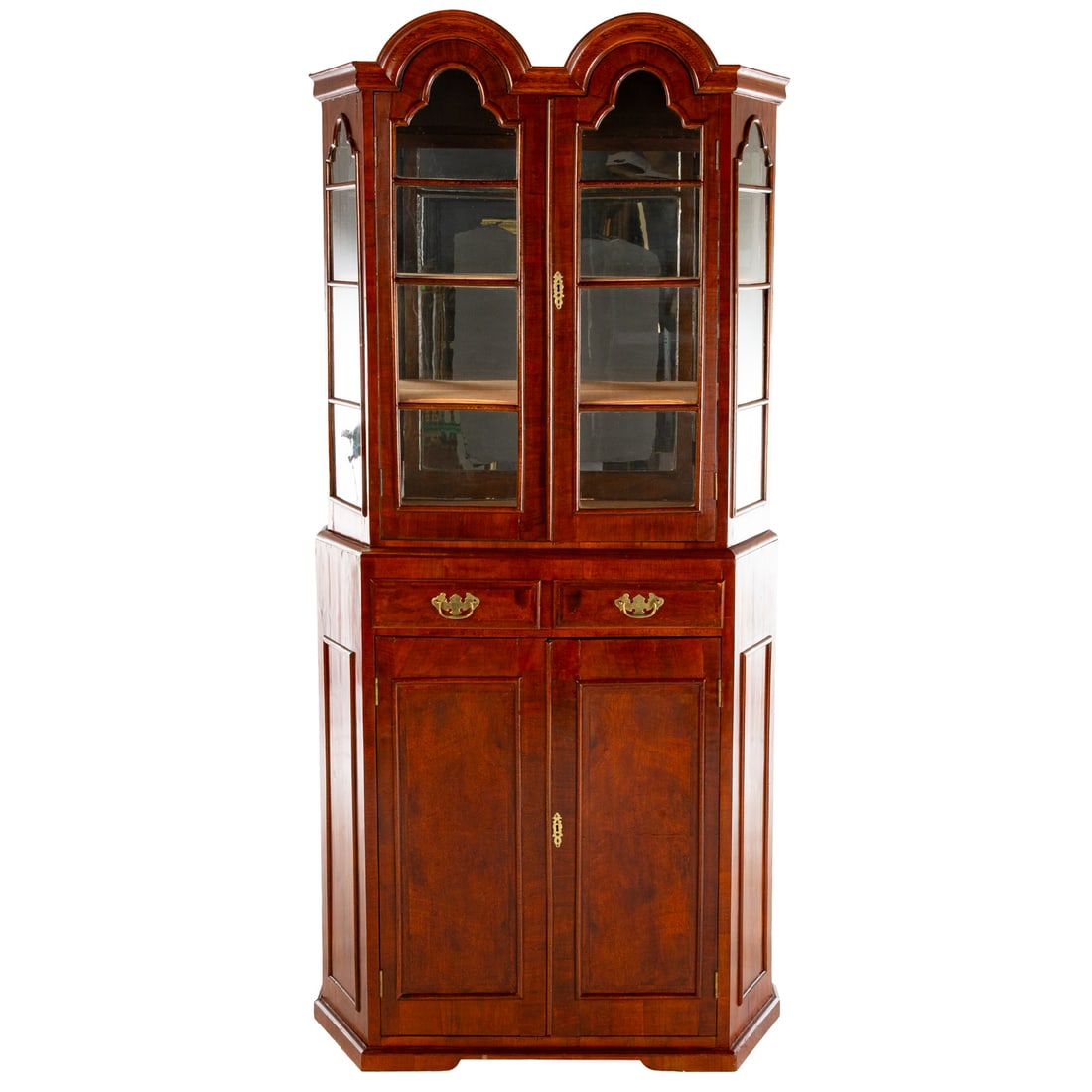 William and Mary Style Oak & Walnut China Cabinet: Double tombstone arch over two glazed door cabinet resting on a two drawer, two door blind cabinet, 76 in. H, 36 in. W, 11 in. D