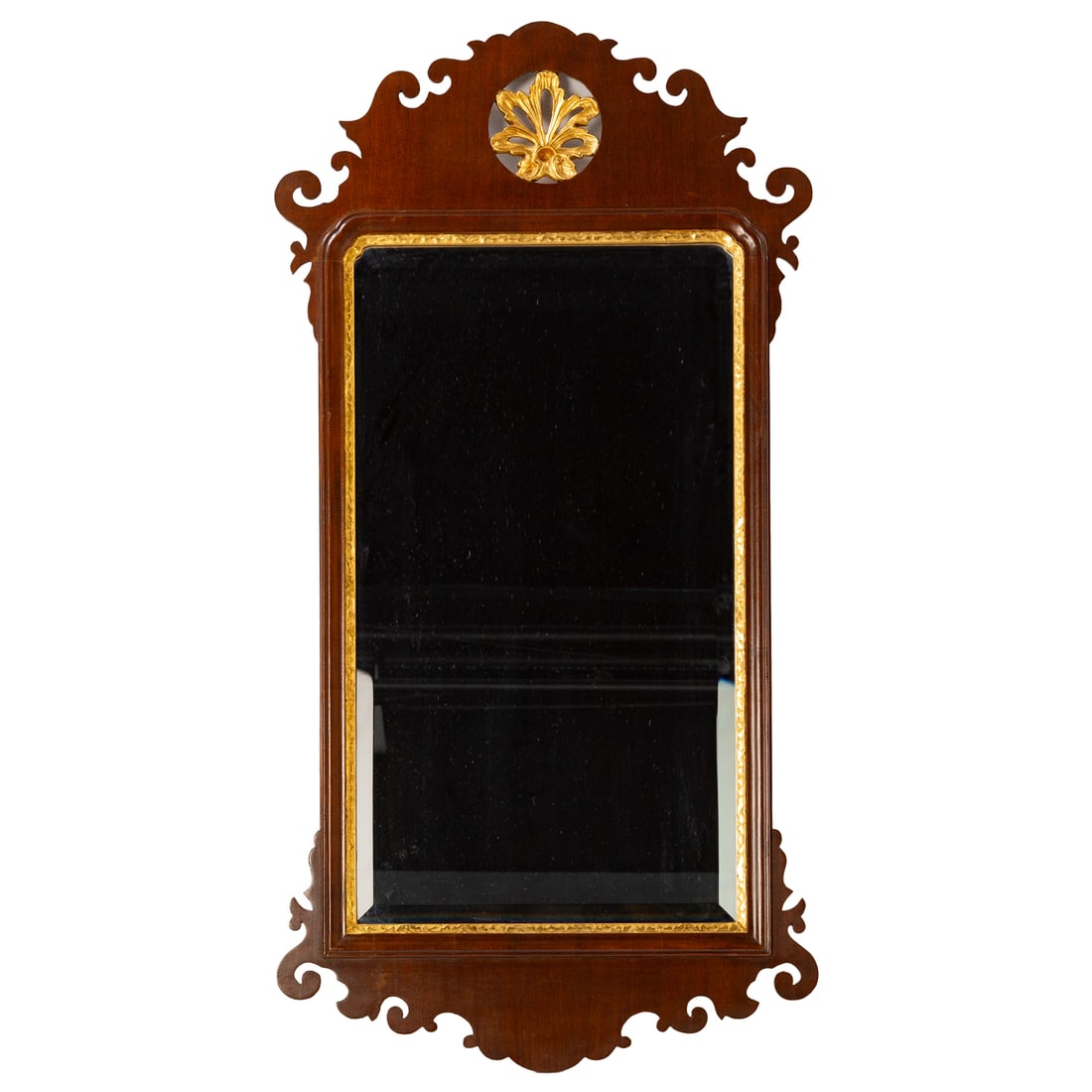 Friedman Brothers Colonial Williamsburg Mirror: Carved and scrolled partial gilt mahogany frame with beveled glass mirror, 42 x 21 3/4 in.