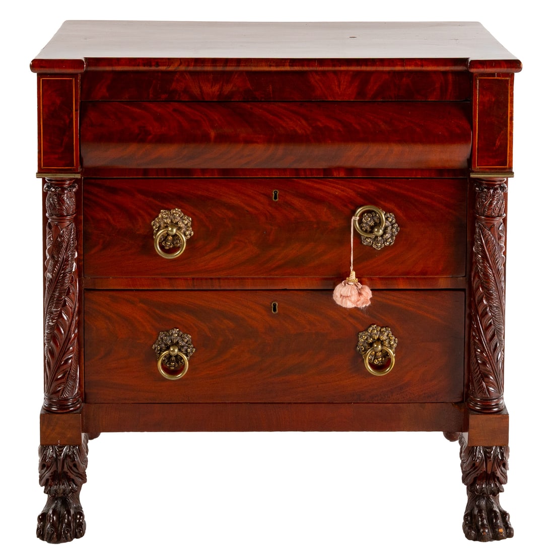 American Empire Mahogany Chest: Circa 1840, shaped top, over three drawers with carved acanthus leaf columns, on lion paw feet, 35 1/2 in. H, 35 in. W, 19 1/2 in. D