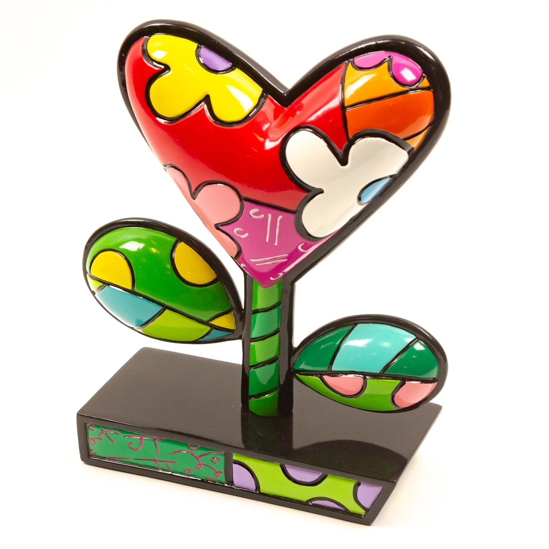 Romero Britto. "Love Grows," resin sculpture: (Brazilian, b. 1963) Hand painted resin sculpture, 2020, from the Arabi numbered edition of 500, ed. 65/500, signed in black "Britto" on the heart, 10 in. H, 8 1/8 in. W, 3 3/8 in. D Provenance: