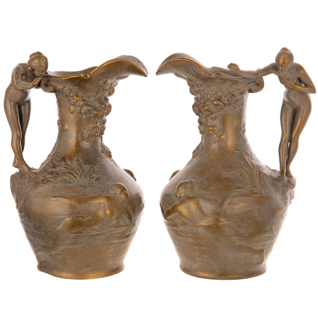 A Pair of Charles Théodore Perron Art Nouveau Ewers: Charles Théodore Perron (French, 1862-1934) A pair of metal Art Nouveau ewers with female nude figural handle, high relief flowers around neck, and two women swimming, signed "Ch. Perron," 8 3/4 in. 